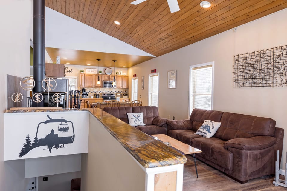Living Room Kitchen View.  75" TV on wall as well.  