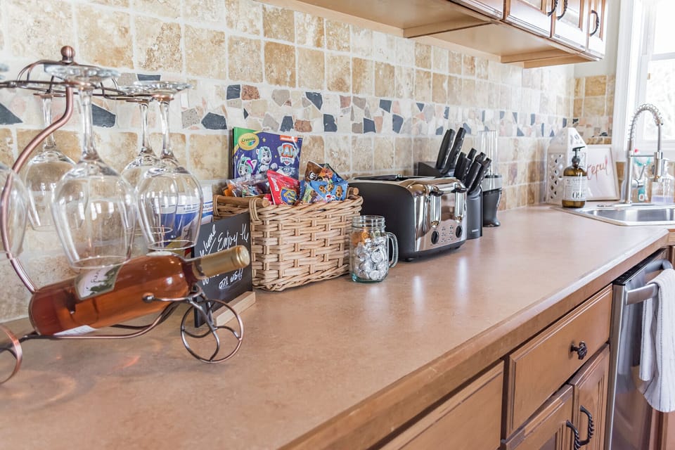 Kitchen Counters, Toaster, Wine Glasses.  