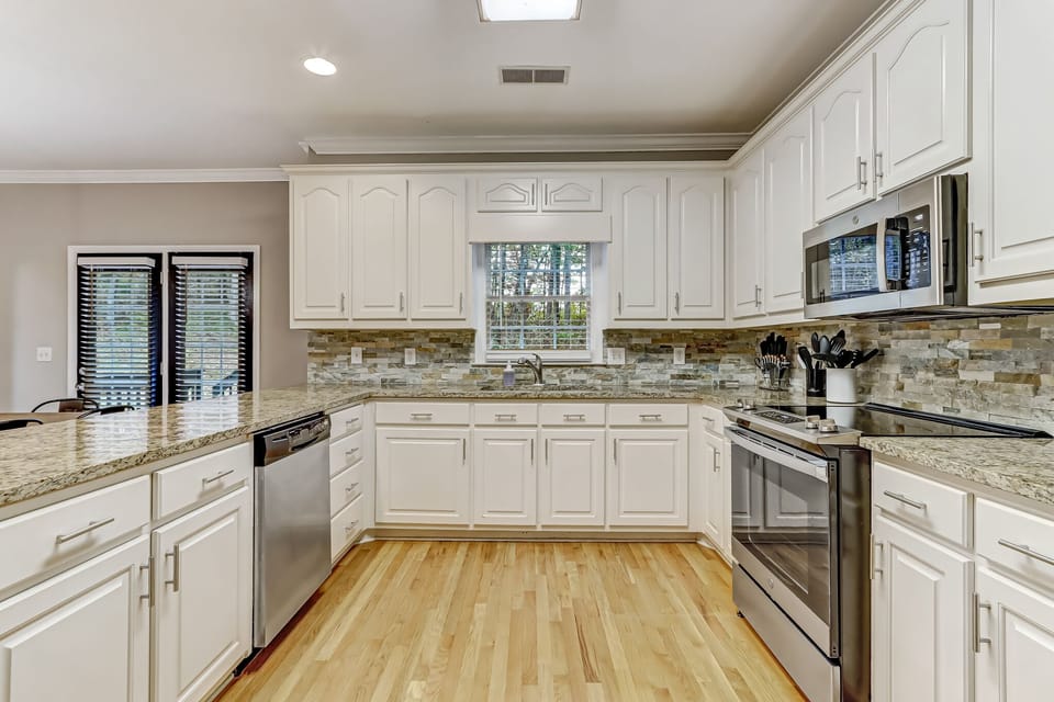 Fully equipped kitchen with granite countertops