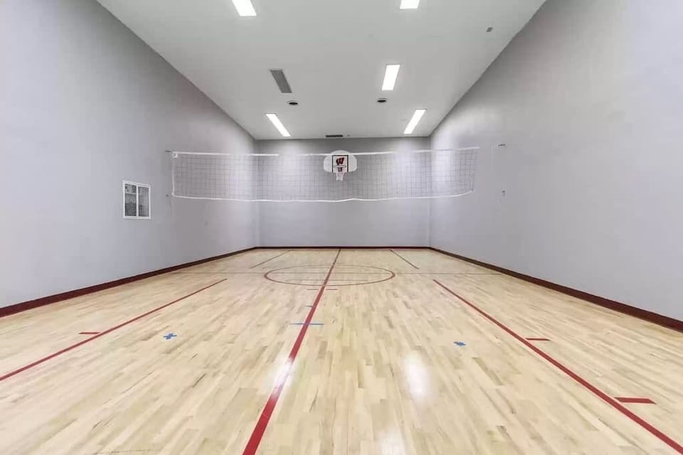Enjoy your own indoor basketball court/volleyball court.  This room is located just off of the arcade.  