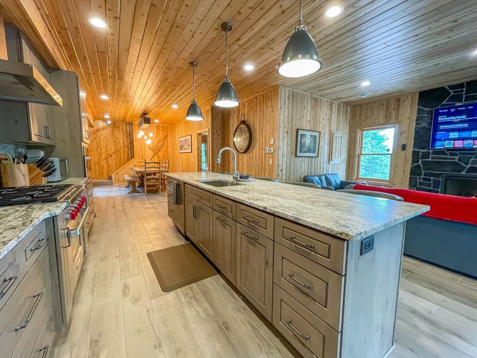 The countertops found throughout the home are a unique granite countertop with a leathered finish