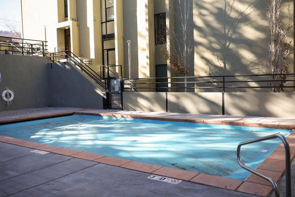 Outdoor heated pool with views of Park City Mountain Resort