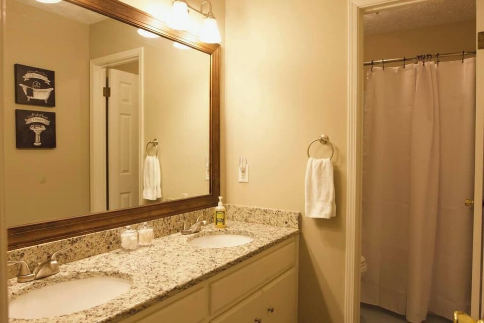A double vanity hallway bathroom