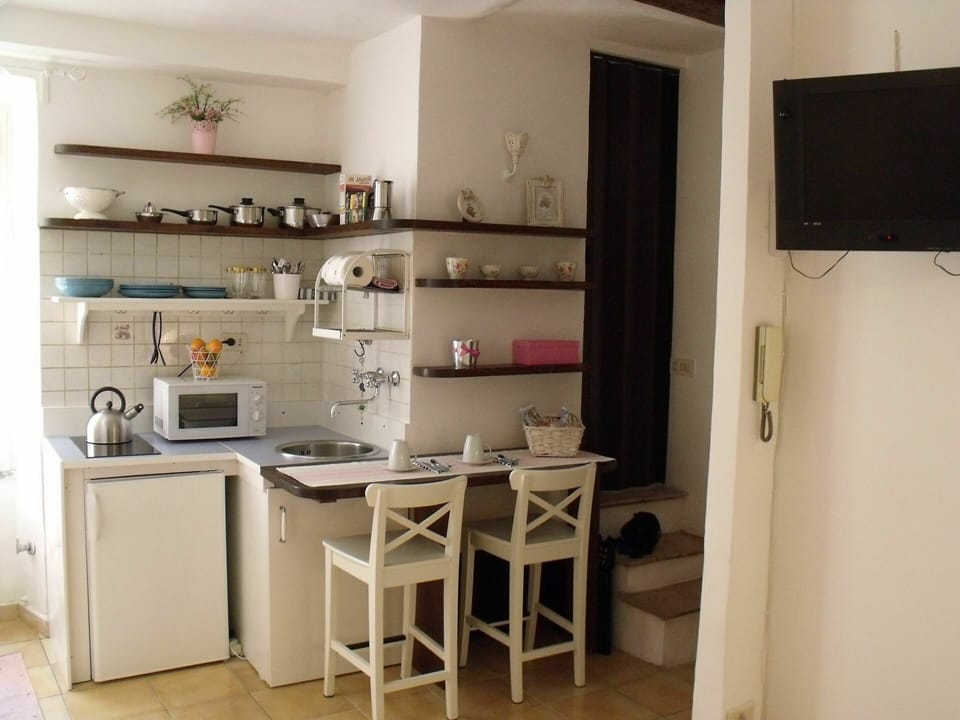 Property, Shelf, Table, Shelving, Wood, Desk, Countertop, Cabinetry, Interior Design