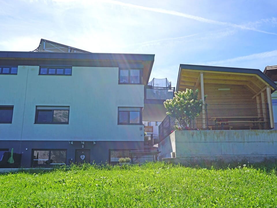 Cloud, Plant, Sky, Building, Property, Window, Land Lot, Wood, Grass, House