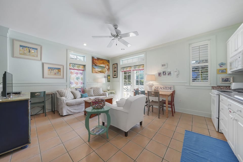 LIVING ALTERNATE VIEW WITH FLATSCREEN, NEXT TO BALCONY