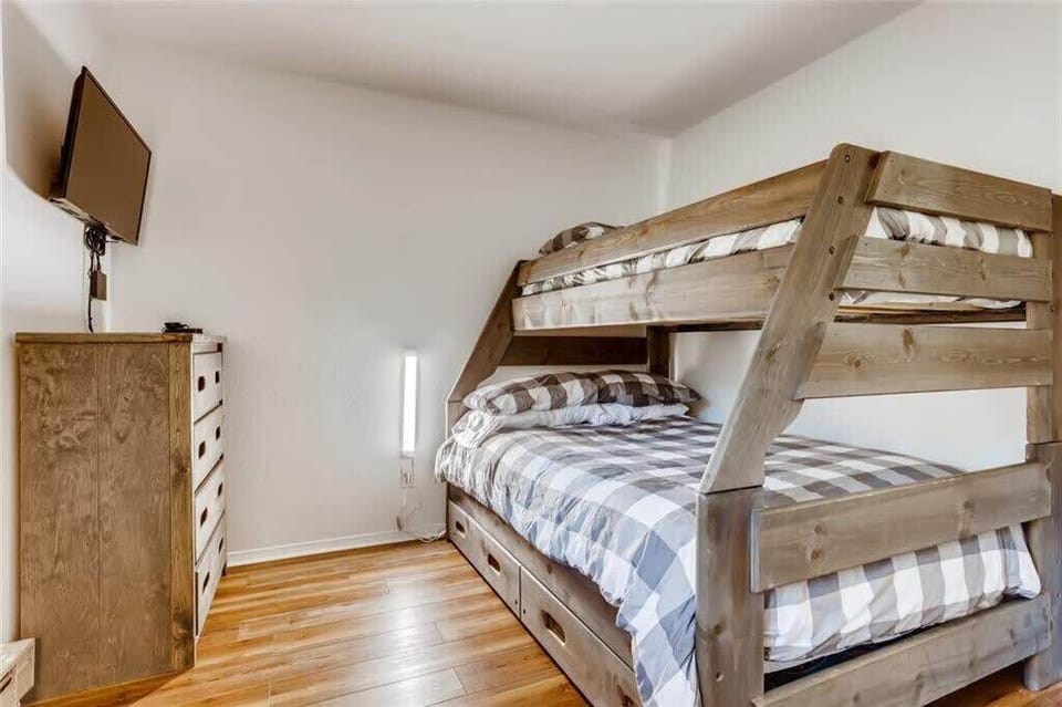 Second bedroom features a comfortable twin over full bunk bed with a twin-size trundle, and a flat-screen TV