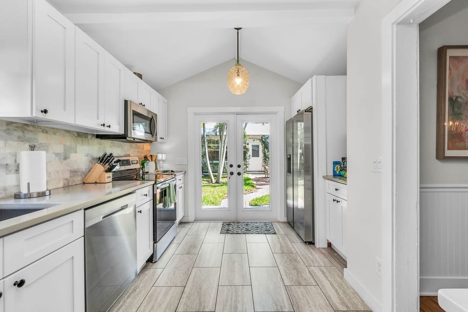Amazing kitchen with everything you need to cook up the perfect family meal! Stainless steel appliances, drip coffee maker, toaster, double fridge and direct access to the outdoors through the French doors.