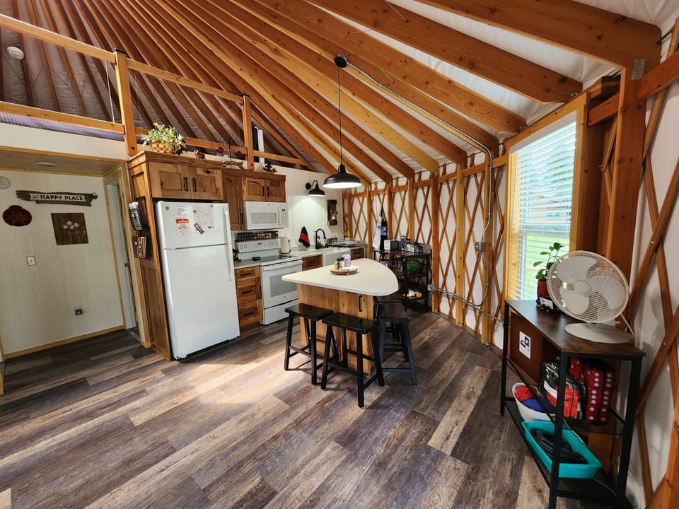 Beautiful well stocked kitchen.