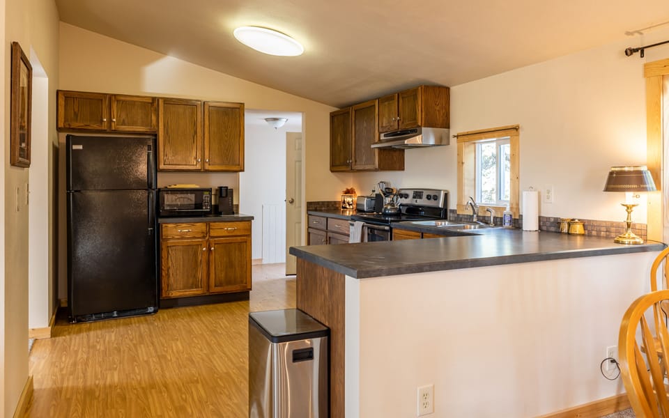 Full kitchen including basic cooking items