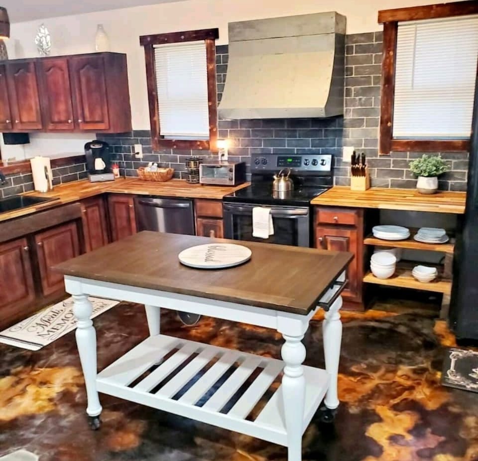 Spacious kitchen for cooking and entertainment. 