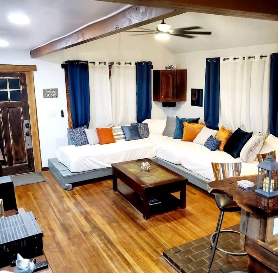 Large solid custom couch bed for the entire family for movie night! 