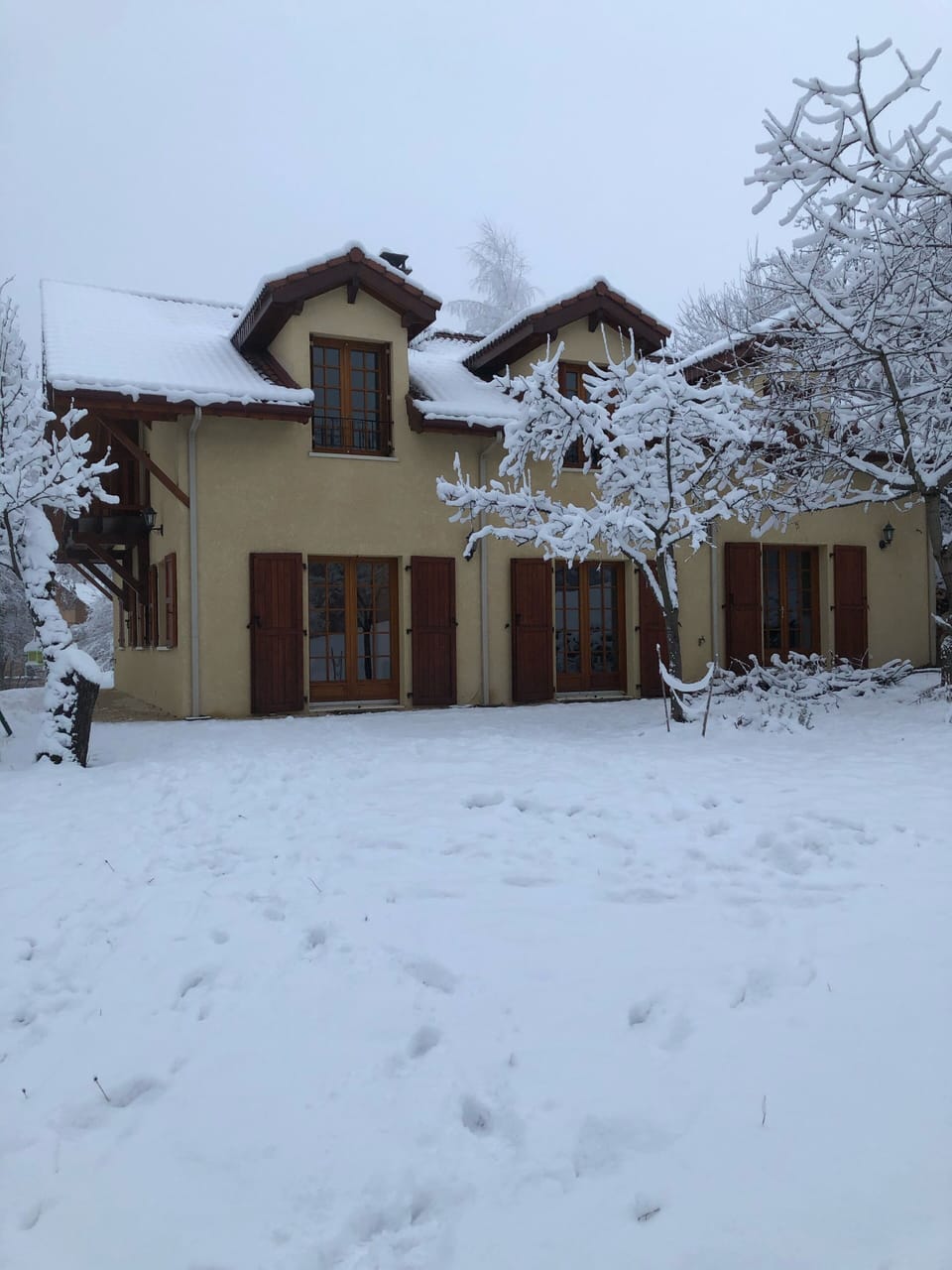 Spacious and private yard provides for snow fun