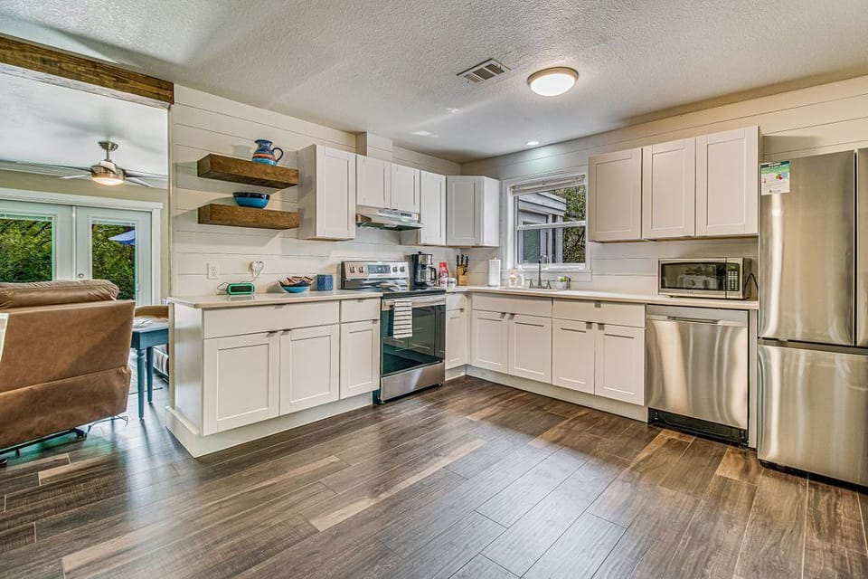 Full kitchen is nicely equipped to enjoy meals at home. All new appliances.