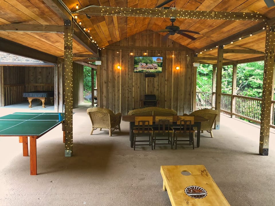 Outdoor gaming and entertainment. Pool table, ping pong, TV with surround sound.