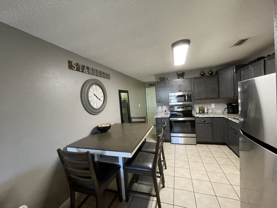 Kitchen, renovated, wood cabinets, Granite, Stainless Steel appliances and tile