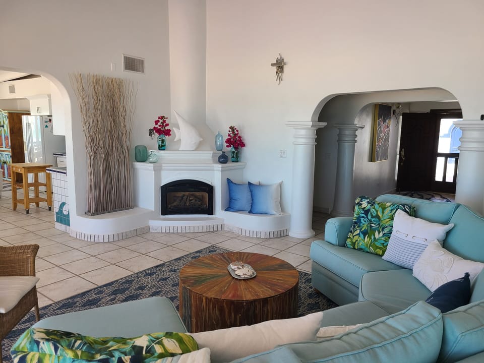 Living room opens to kitchen