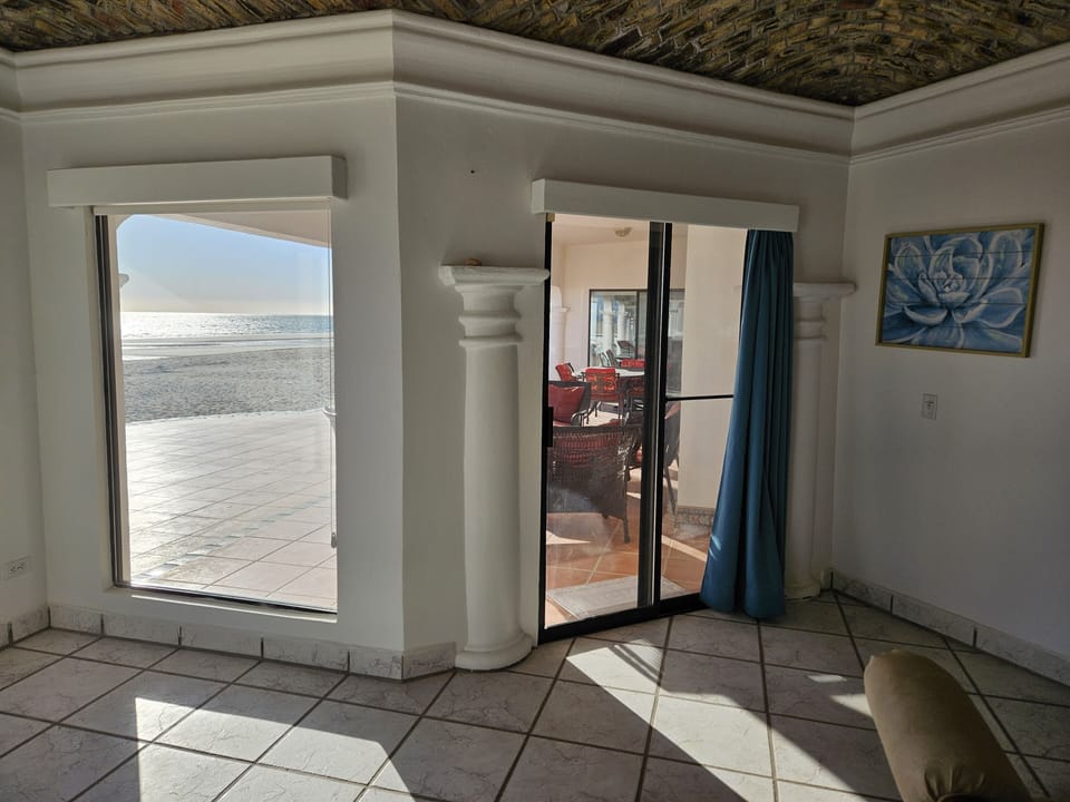 Master Suite opens to patio & beachfront