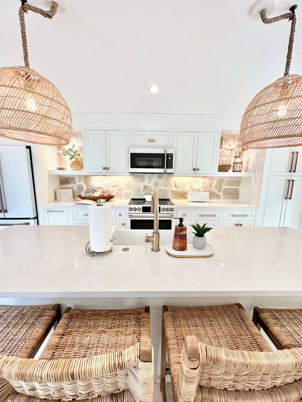 Custom stone backsplash, electric oven, farmhouse sink, island for 6