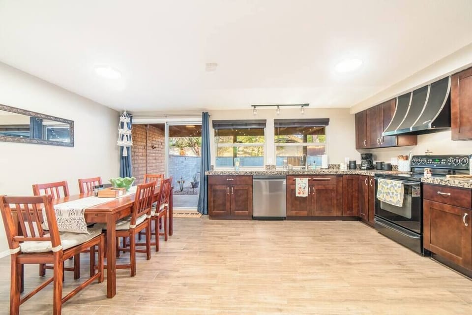 Huge Chef's kitchen and dining table with plenty of room to move around.