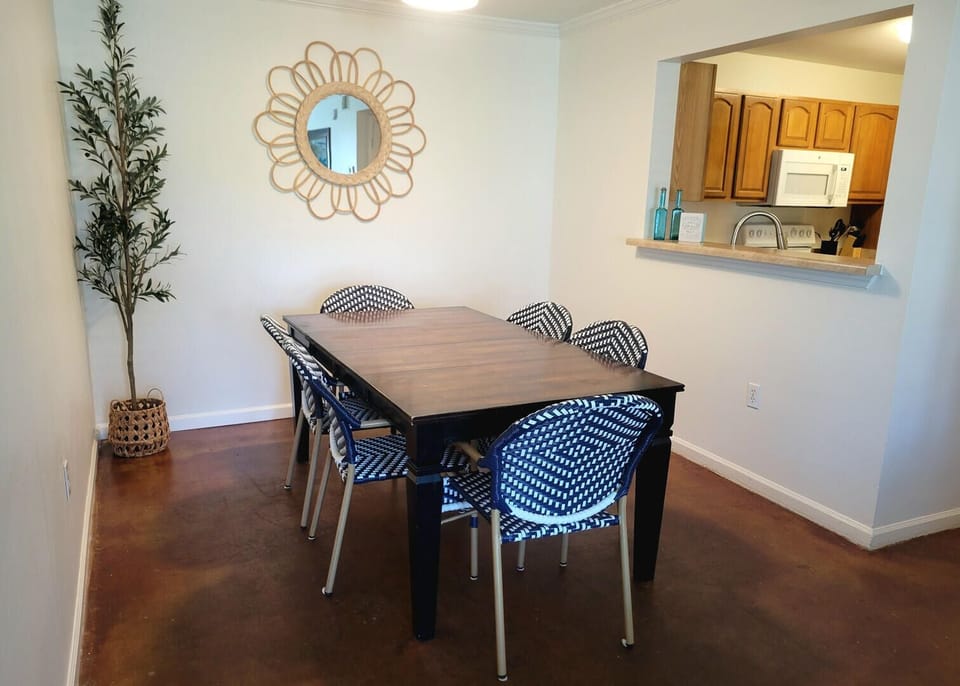 The dining area provides a welcoming space for meals, conversations, and creating lasting memories with loved ones.