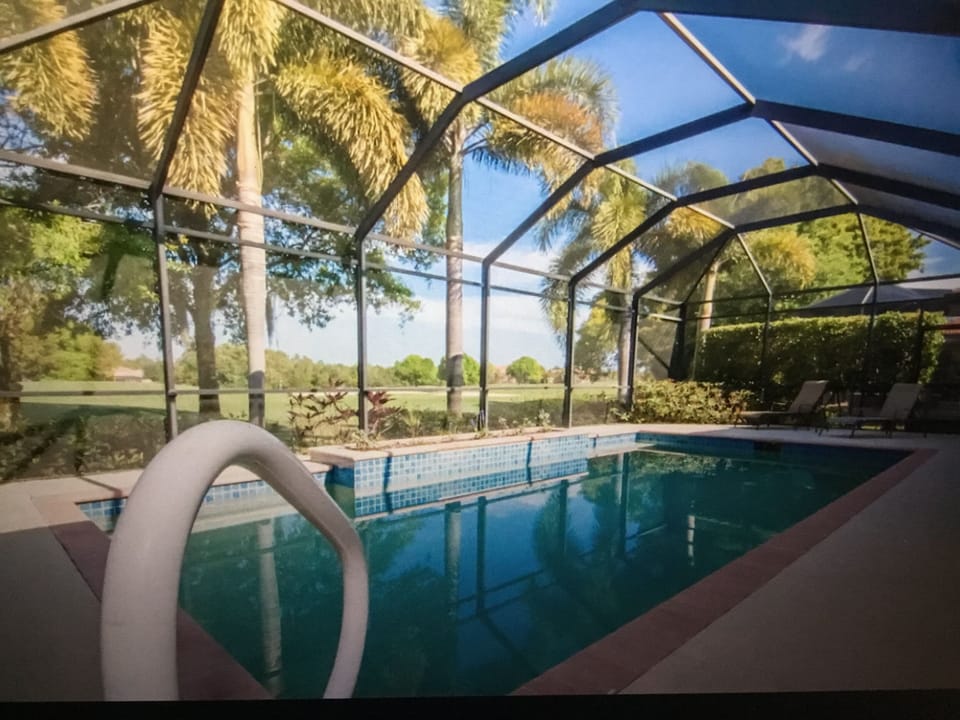 Luxurious heated pool. Fully equipped with floats, toys, lounge chairs & towels