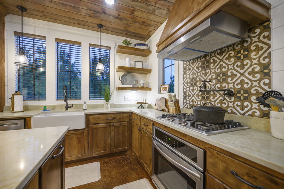 Equipped with a gas stove and an oven.