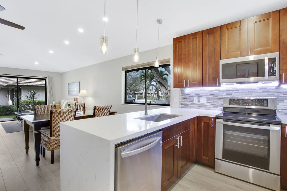 We've equipped the kitchen with dinnerware, glasses, pots, pans, and more. 