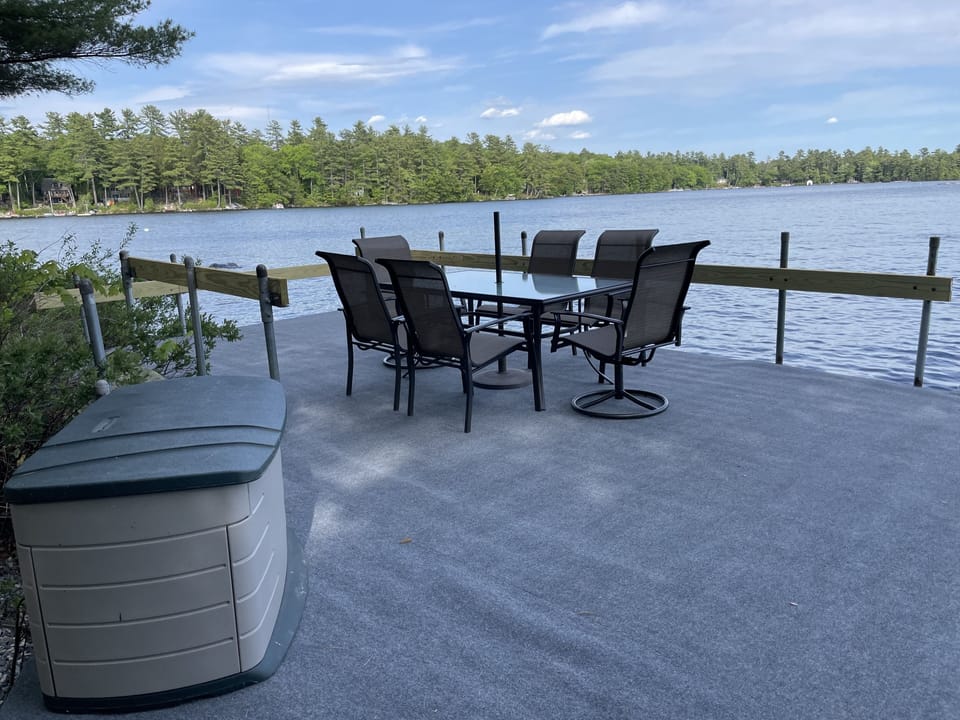 Large patio table for dining and relaxing on the dock. 
