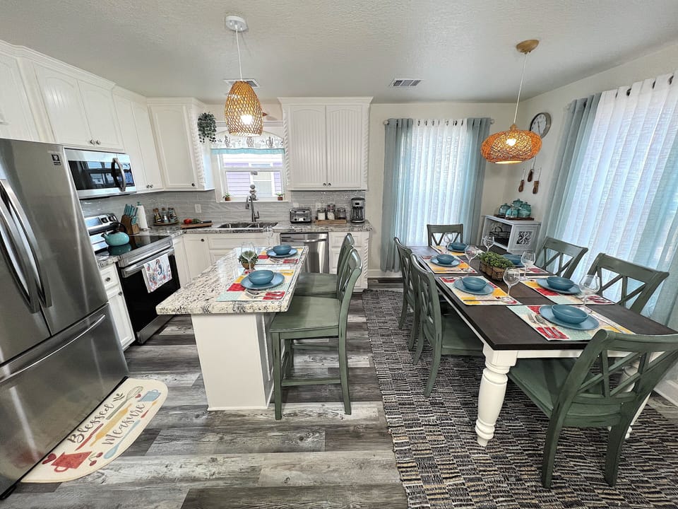 Fully equipped kitchen with all utensils and condiments, oils, and supplies