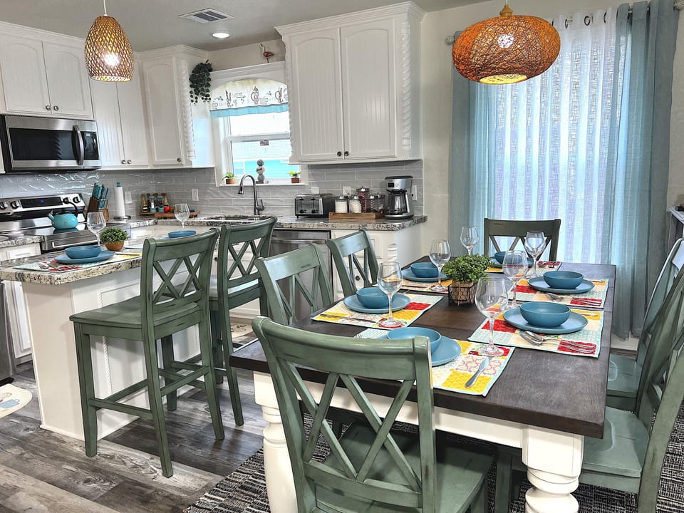 Fully equipped kitchen with all utensils and condiments, oils, and supplies
