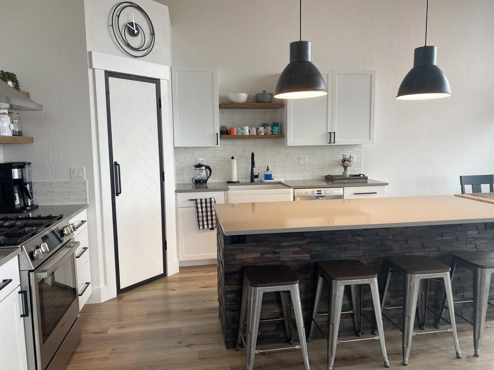 large corner pantry with microwave and air fryer