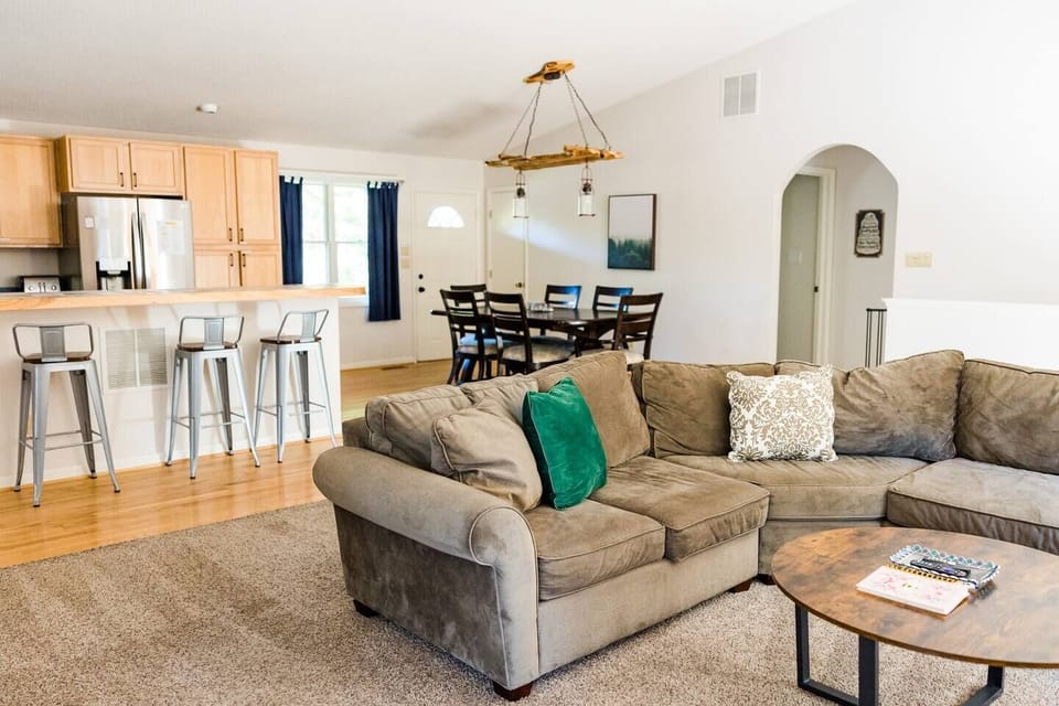 Very large sectional in the living room open to the kitchen and dining room. Great space to gather and spend time together.