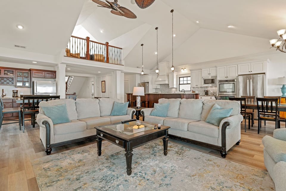 Spacious Living Room with Deck Access on Third Level