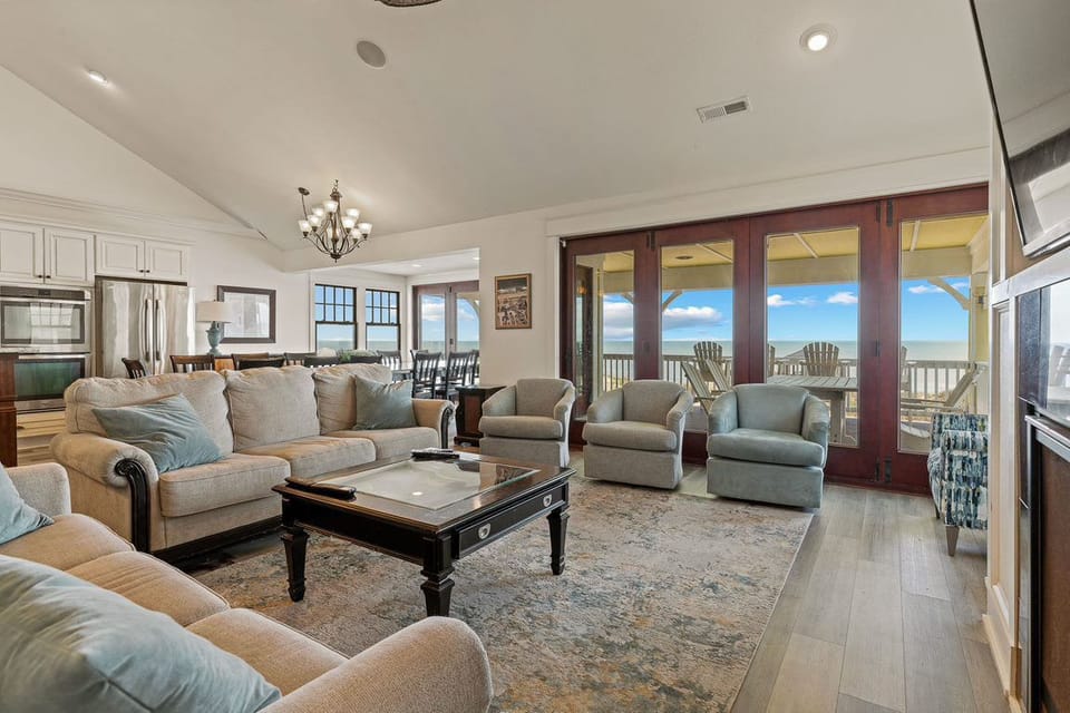 Spacious Living Room with Deck Access on Third Level