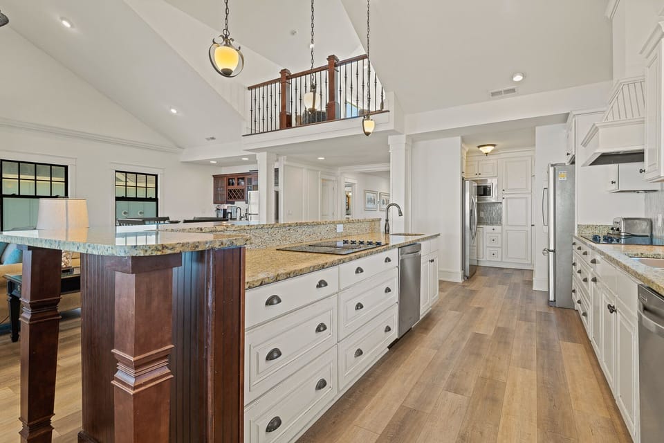 Kitchen with Bar Seating on Third Level