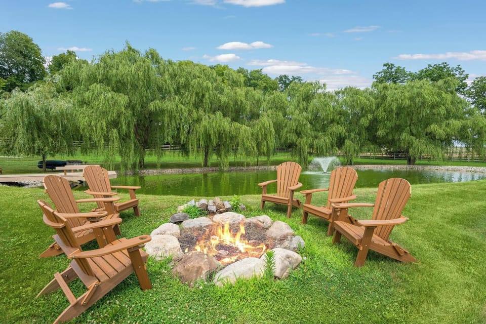 Hang Out by the Firepit by the Pond at the Grandview Farm.