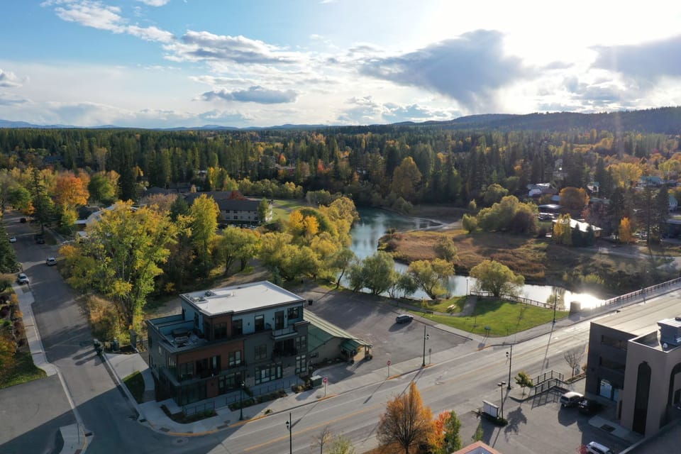 Aerial view of the building showcasing proximity to the Whitefish River