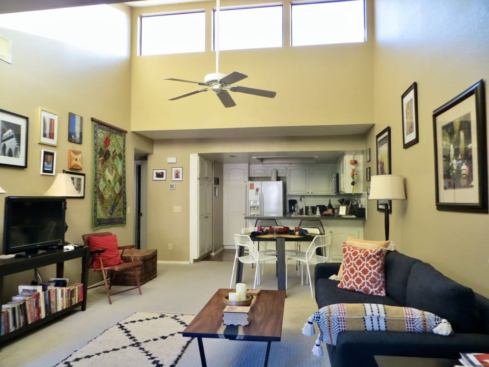 Open floor plan with vaulted ceiling and lots of light
