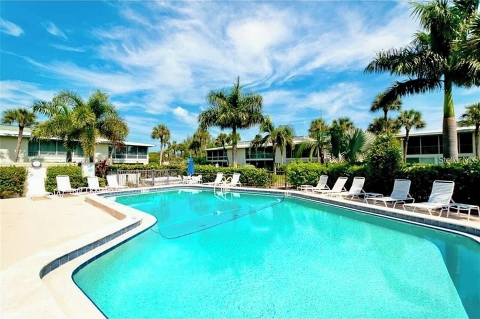 Heated main pool, just steps away - one of two in the in the community. 