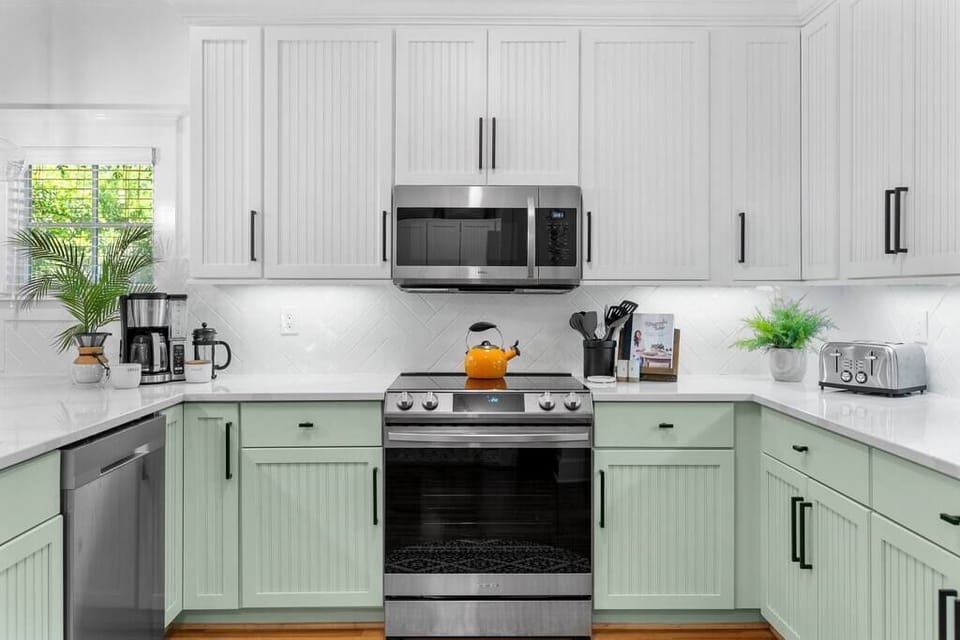 Our large kitchen features new quartz counters, brand new stainless appliances