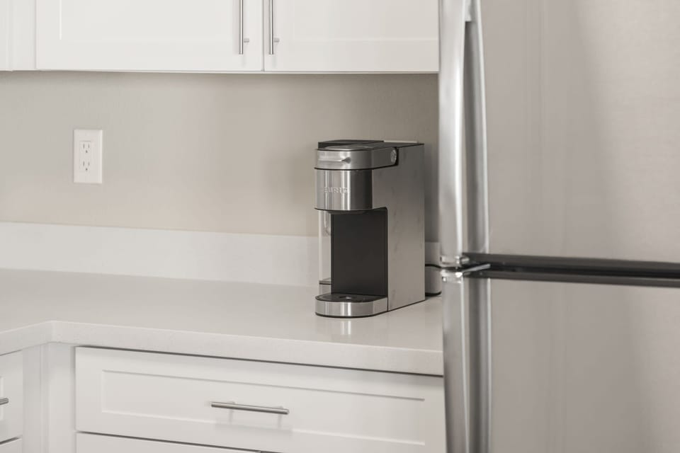 Start your day energized using the Keurig machine supplied with complimentary coffee pods