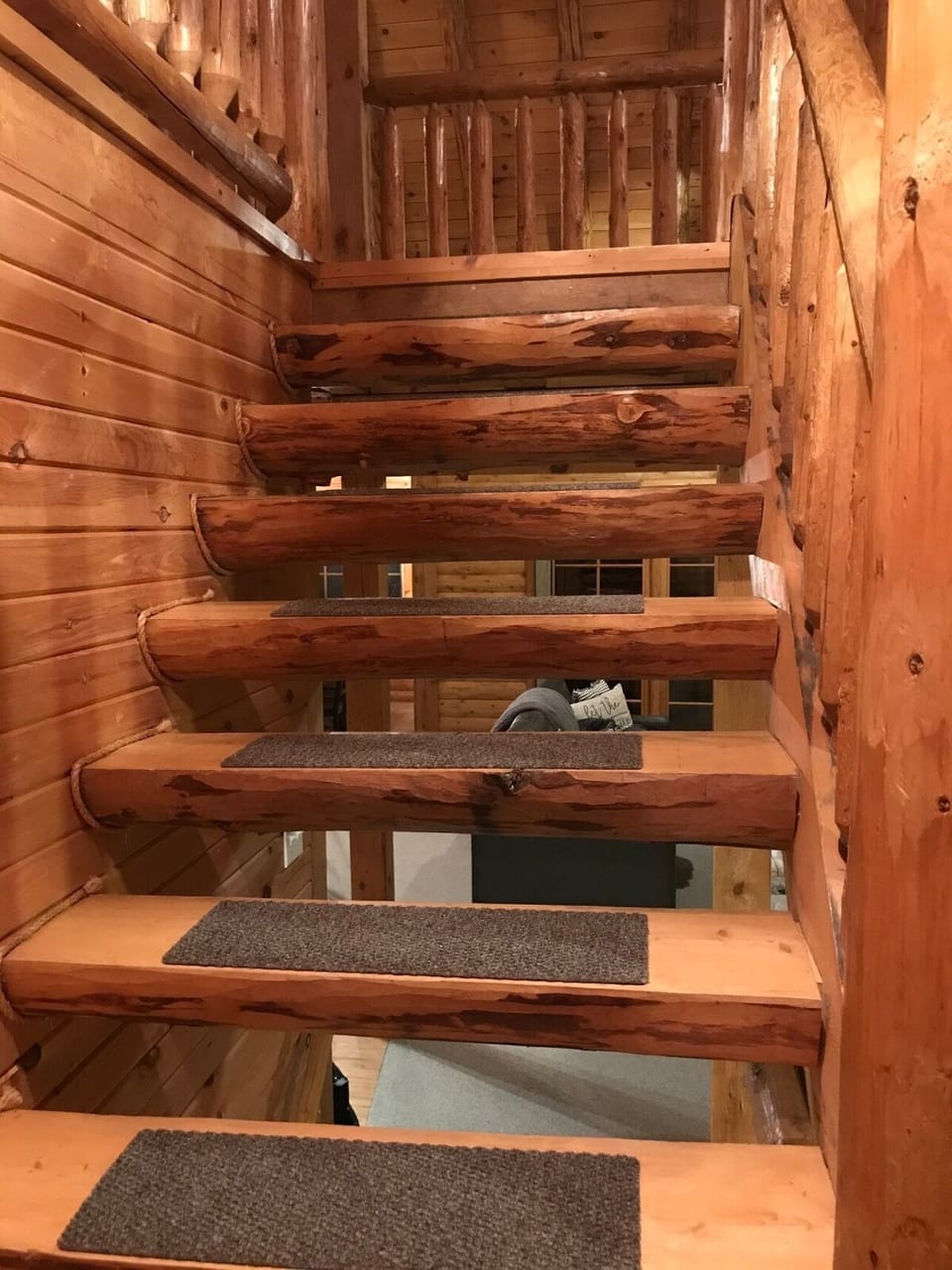 Log staircase to the loft