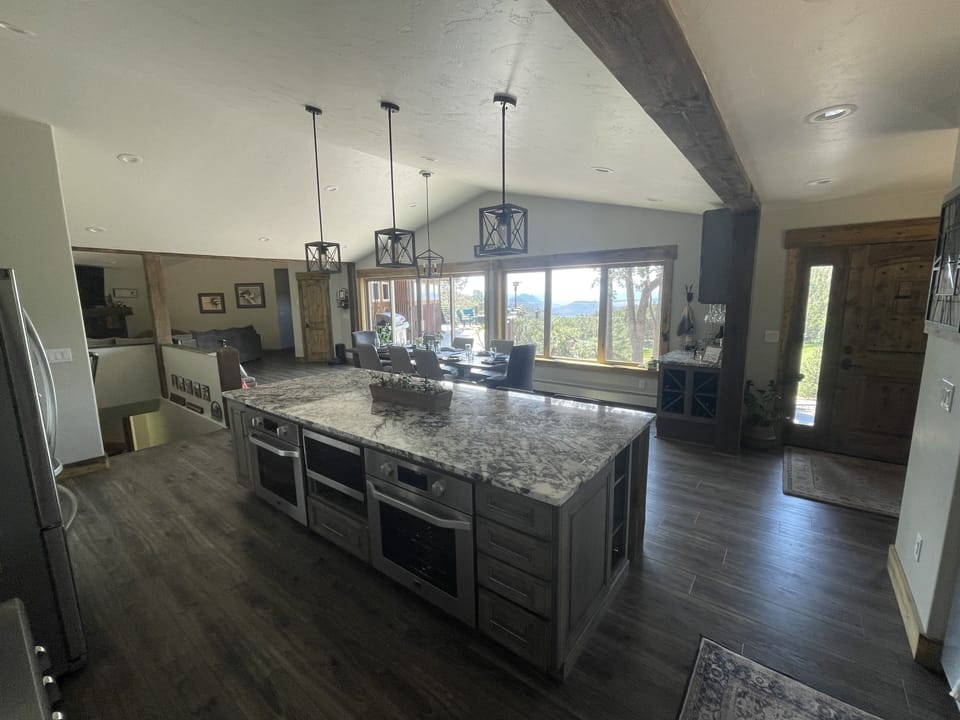 10 foot island with 2 full sized ovens and seating for 4. 