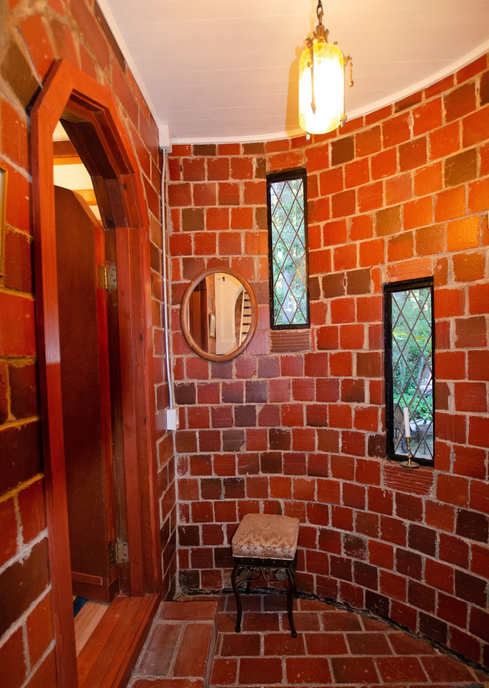 Turret entryway with private entrance to downstairs master bedroom