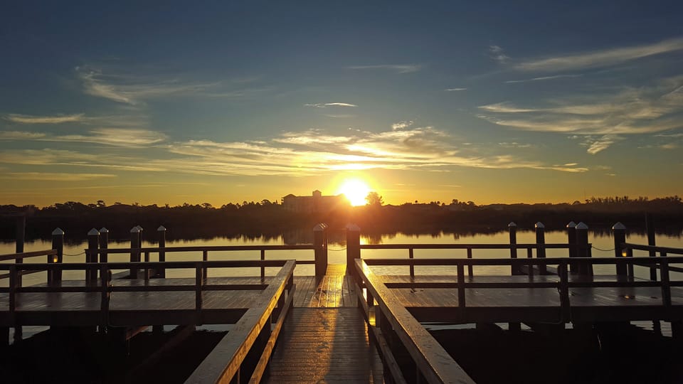 Soak up glowing sunsets over the private dock and water.