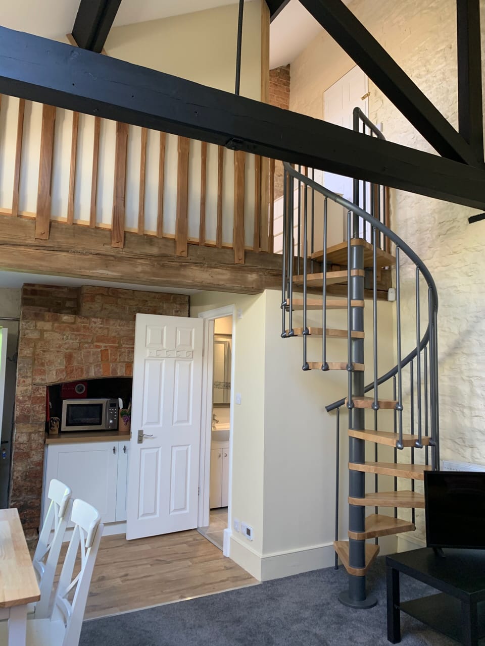 Double height ceiling with mezzanine