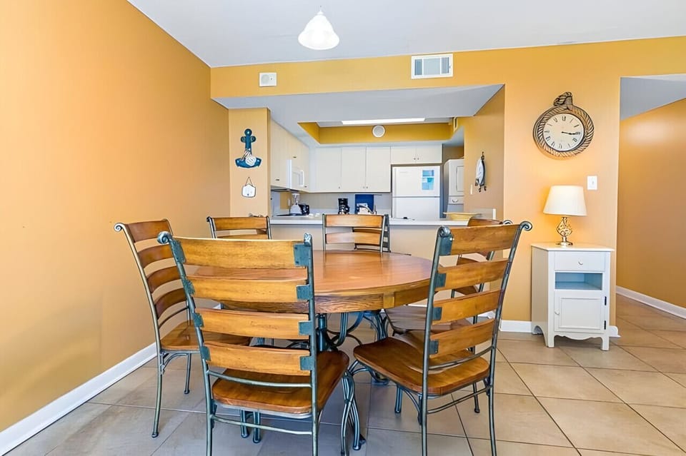Dining table, snack bar, and kitchen