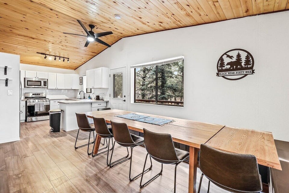 14 person dining table with custom built breakfast nook bench to enjoy meals
