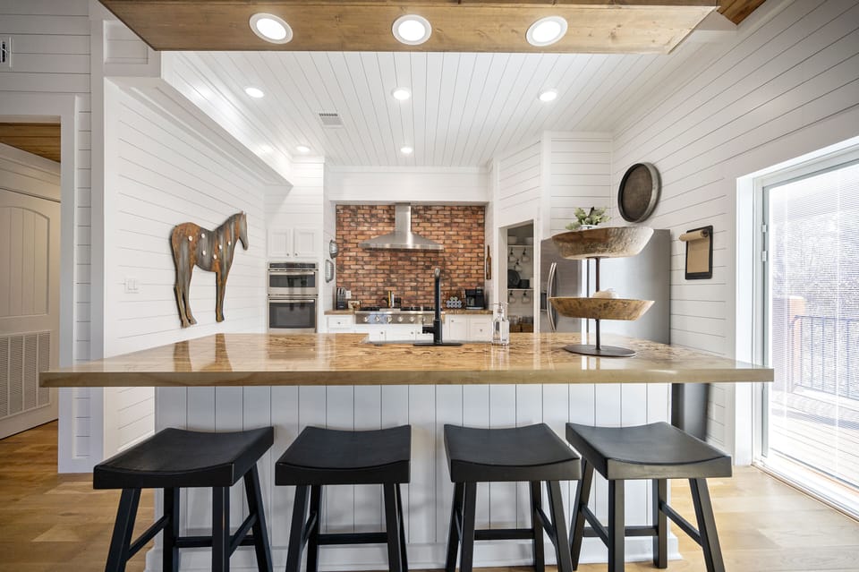 4 seats at the island in the kitchen!